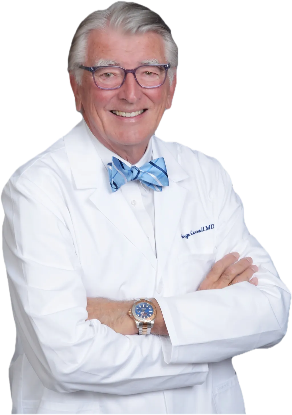 George W. Carroll, MD, in a white medical coat